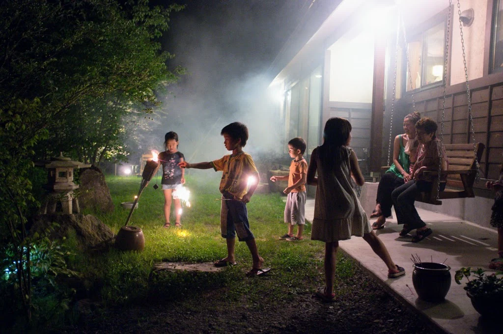 Children enjoying an evening outside Rental Farmhouse Tamaki