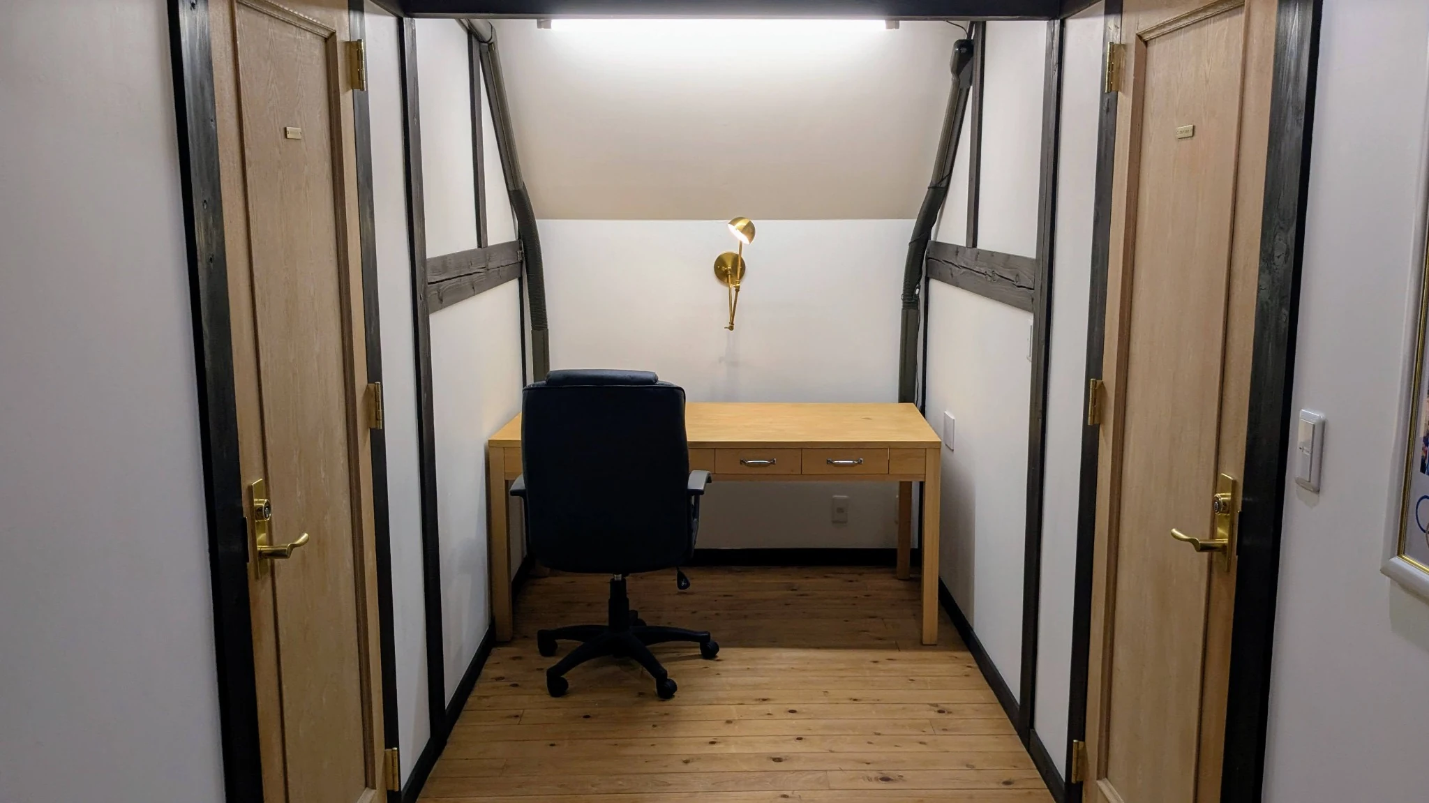 Desk workspace at the end of the upstairs corridor at Rental Farmhouse Tamaki