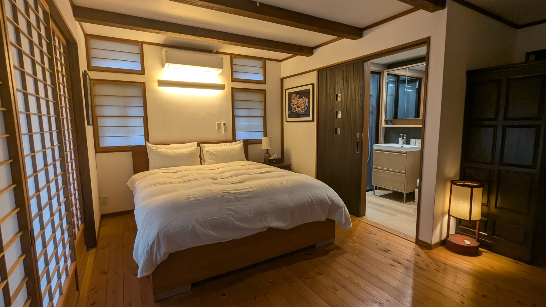 Restored double bedroom with ensuite bathroom at Rental Farmhouse Tamaki