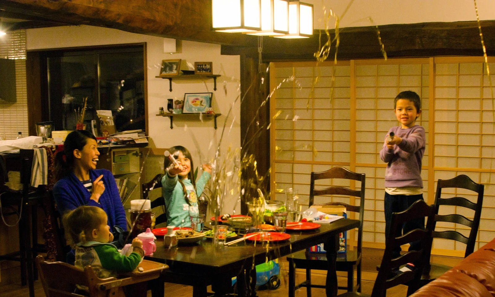 Family birthday celebration inside Rental Farmhouse Tamaki in April 2014