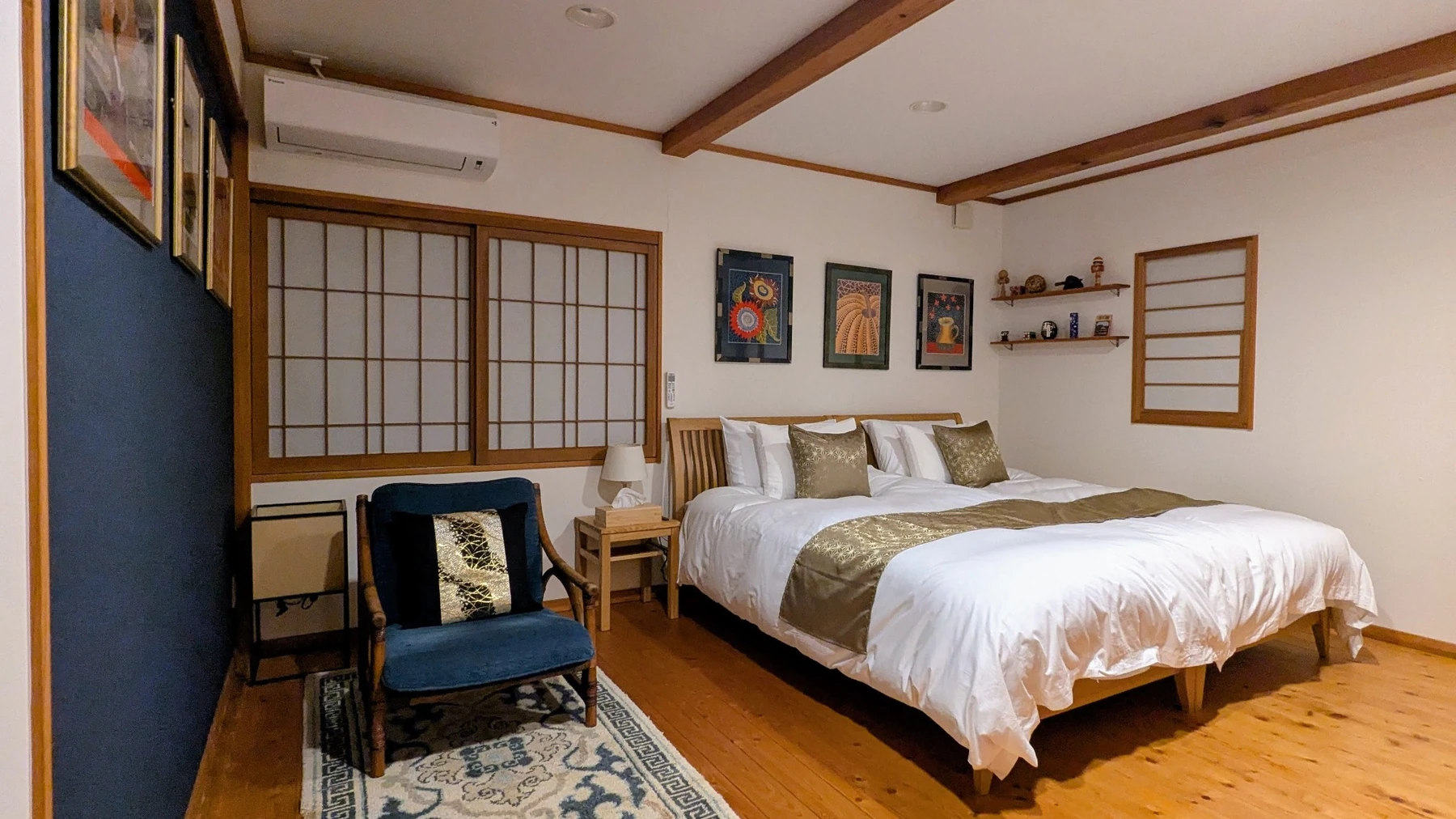 Twin bedroom at Rental Farmhouse Tamaki with the beds configured together as a king