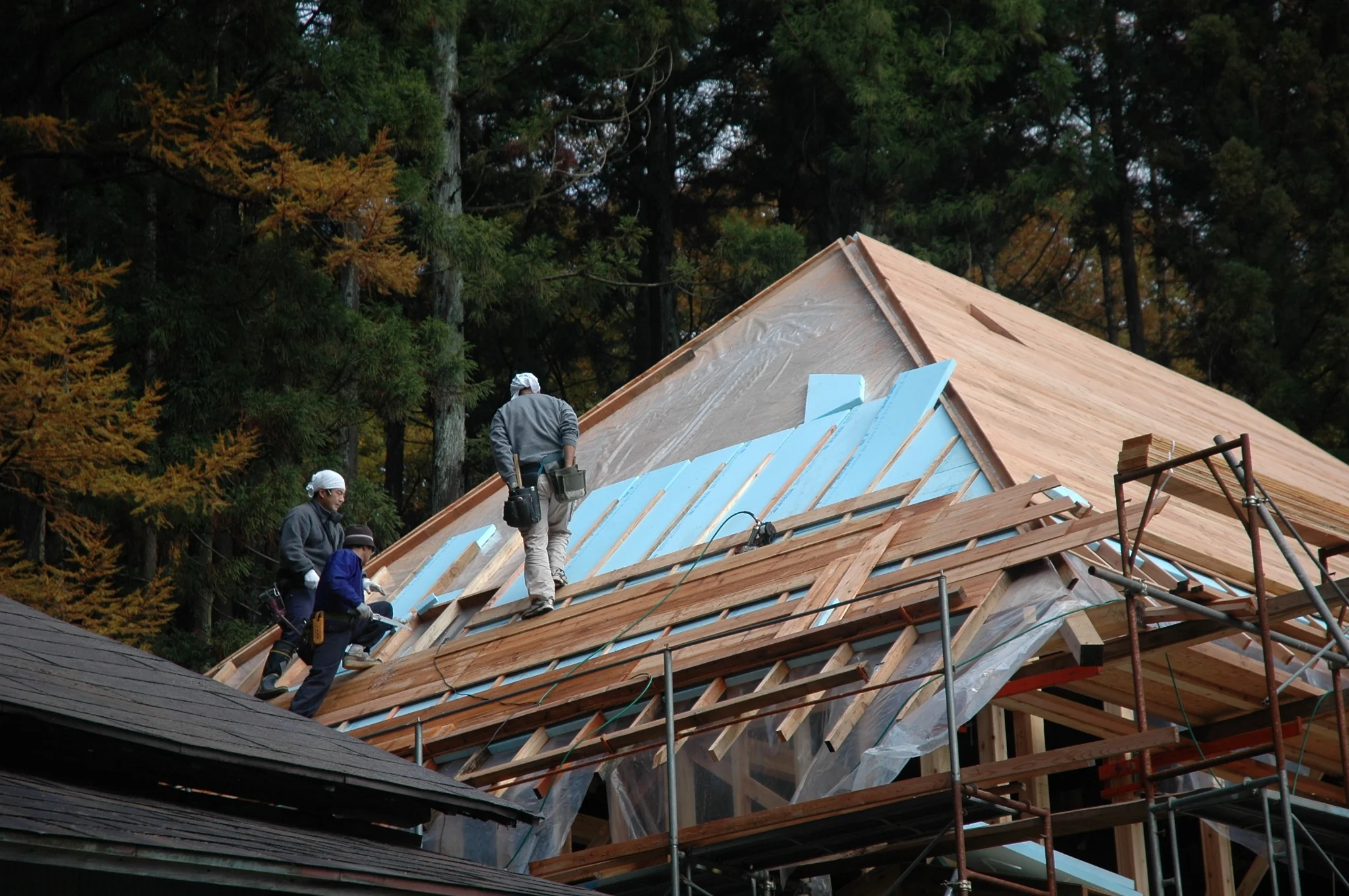 Insulation work being carried out during the renovation of Rental Farmhouse Tamaki