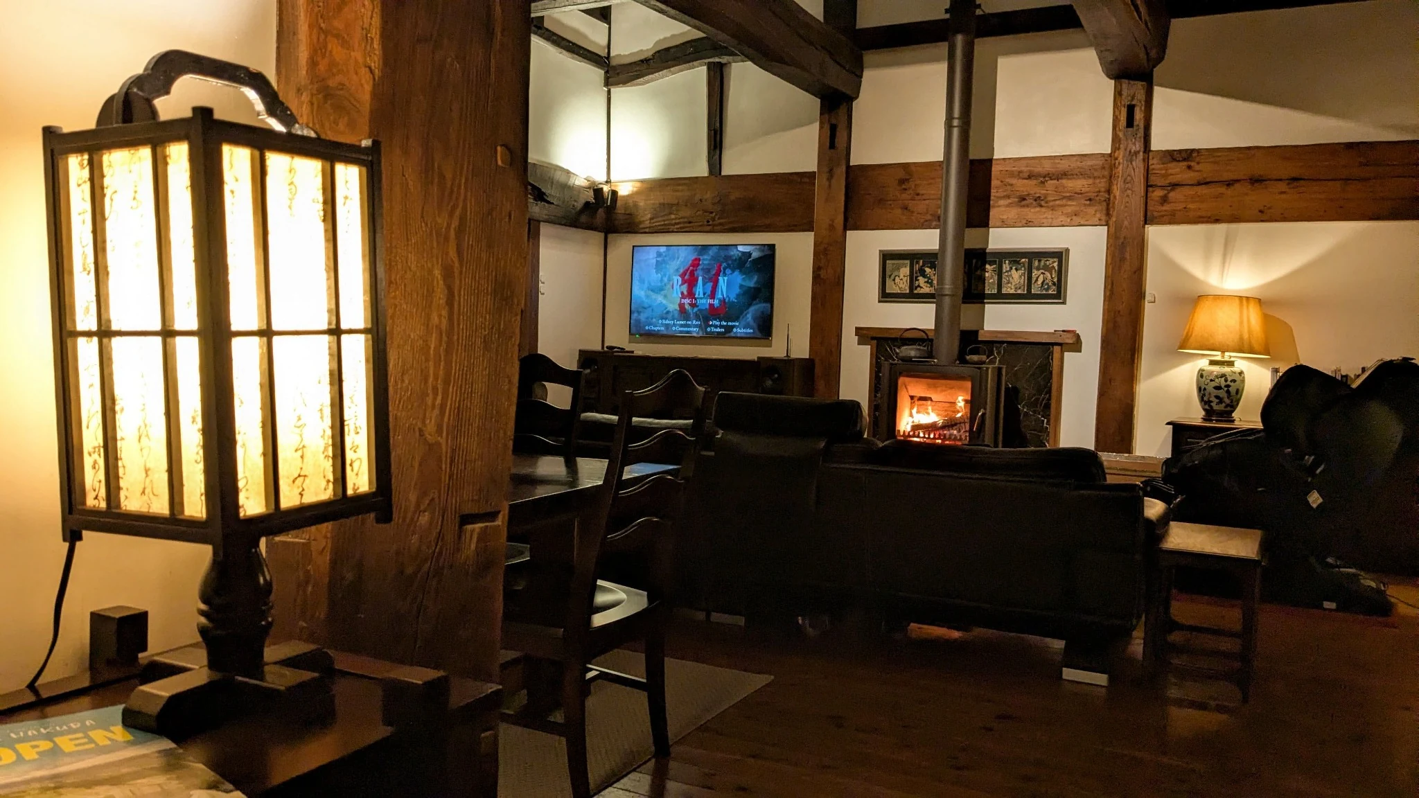 Living area and woodstove at Rental Farmhouse Tamaki after a day in the snow